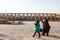 Women wearing modest islamic clothing, islamic scarf, veil and hijab walking in the streets of Isfahan, Iran, on Imam Ali Square