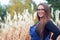 Women wearing overalls wheat field countryside farming agriculture outdoor blue jeans glasses joyful worker