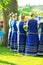 Women wearing ukrainian clothes with embroidered flowers celebrating pagan holiday of Ivan Kupala, back view