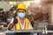 Women worker wear disposable face mask for protection Corona Virus Spreading and smoke dust air pollution filter in factory for