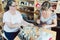 Women working with various gemstones