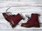 Womens accessories, footwear burgundy boots, yellow wireless headphones. Fashion outfit, shopping concept, flat lay