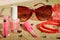 Womens accessories: sunglasses, lip gloss, nail polish, beads