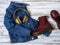 Womens clothing, accessories, footwear burgundy boots, yellow wireless headphones, denim jacket. Fashion outfit. Shopping