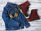 Womens clothing, accessories, footwear burgundy boots, yellow wireless headphones, denim jacket. Fashion outfit. Shopping