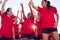 Womens Football Team Celebrating Winning Soccer Match On Outdoor Astro Turf Pitch