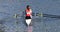 Womens Pairs Sculling on the river Ouse red tops.