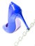 Womens shiny patent blue stiletto heels and steel chain on white background