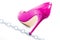 Womens shiny patent purple stiletto heels and steel chain on white background