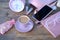 Womens stylish accessories, smartphone with blank screen, glamorous set in pink shades, flat lay, copy background, womens clothing