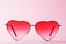 Womens sunglasses on a pink background