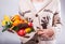 WomWoman holds a sweet eatable bouquet wrapped in paper on blan holds a sweet eatable bouquet wrapped in paper on white background