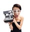 Wondered woman with cassette photographic camera