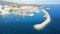 Wonderful aerial photography of the coast of Mallorca, with a luxury yacht in front of the famous Portals harbor, overlooking the