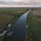 Wonderful aerial shot of fishing huts at sunset near Comacchio