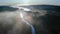 Wonderful aerial view of mist over river in autumn