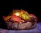 Wonderful autumn composition with multi colored pumpkins and autumnal leaves on a wooden table