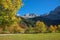 Wonderful autumn landscape, karwendel valley, with maple tree and mountain view