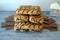 Wonderful biscuit cakes poured with chocolate stand on background