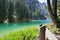 The wonderful Braies lake in the Dolomites in spring with the mountains still covered in snow