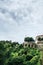 Wonderful city terrace gardens greenery in Bergamo, Italy. Cloudy summer day. Scenic view from old city hill. Beautiful vertical