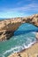 Wonderful cliffs on atlantic coastline with turquoise ocean wave erosion caves in biarritz, basque country, france