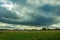 Wonderful cloud with sunlight over the meadow