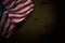 Wonderful dark illustration of USA flag with big folds on dark wood with free place for text - any occasion flag 3d illustration