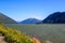 Wonderful day: Beautiful Skeena River leads through beautiful mountain scenery / British Columbia / Canada