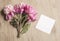 Wonderful Dreamy Mockup With Pink Peonies And A Square Card On Wooden Desktop