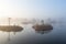 A wonderful early morning by a marsh lake surrounded by fog