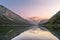 wonderful evening mood at the tyrolean lake plansee with reflection of the mountains