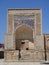 Wonderful gate of a mosque in Uzbekistan with blue sky