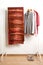 Wonderful large terracotta felted silk woolen scarf hangs on white hanger