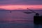 Wonderful magenta sunrise from the pier of Senigallia, Italy