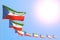 Wonderful many Equatorial Guinea flags placed diagonal with bokeh and free space for content - any holiday flag 3d illustration