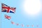 Wonderful many United Kingdom UK flags placed diagonal with bokeh and free space for content - any feast flag 3d illustration
