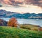 Wonderful morning view of Roselend lake/Lac de Roselend. Exciting autumn scene of Auvergne-Rhone-Alpes, France, Europe. Beauty of