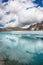 Wonderful mountain landscape with turquoise lake, reflection, peaks . Picturesque view near Adygine lake.