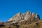 Wonderful mountain peak rising up in blue sky