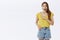 Wonderful news I am so excited. Portrait of surprised and amazed happy cute adult european female in yellow t-shirt and