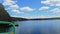 Wonderful place to relax on the lake. Lovely clear blue waters and white cumulus clouds.