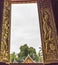 Wonderful sculpture on the door of Wat Xieng Thong in luang prabang, laos