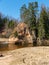 Wonderful spring landscape with beautiful sandstone cliff, clear river water