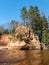 Wonderful spring landscape with beautiful sandstone cliff, clear river water