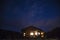 Wonderful starry sky above the farm house.