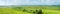 Wonderful summer panoramic view of fields and motorway