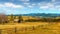 Wonderful Sunny Landscape in the alpine highlands in spring. Perfect blue sky over the rural meadow, fantastic picturesque Scene.