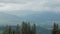 Wonderful view on alpine meadows near mountains in cloudy day