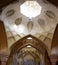 A wonderful view from inside the dome-shaped roof of an ancient building with beautiful Iranian geometric decorations. Shiraz,Iran